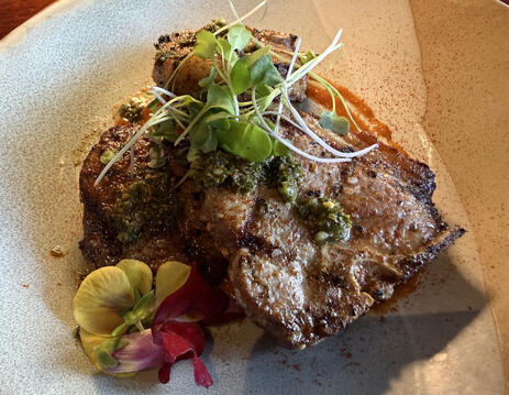 Lamb T-Bone with oven roasted tomato puree, A Land Remembered at the Rosen Shingle Creek resort